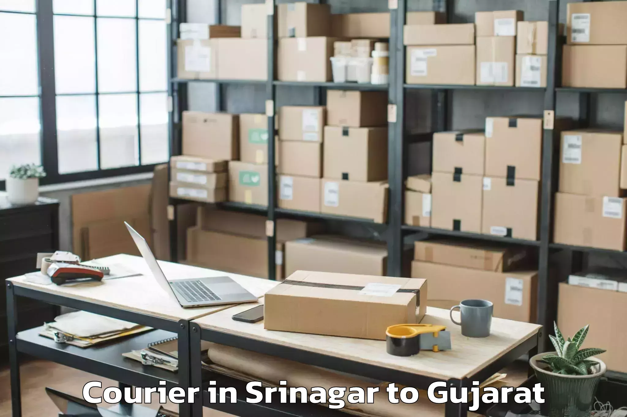 Book Srinagar to Vaghodia Ina Courier Online